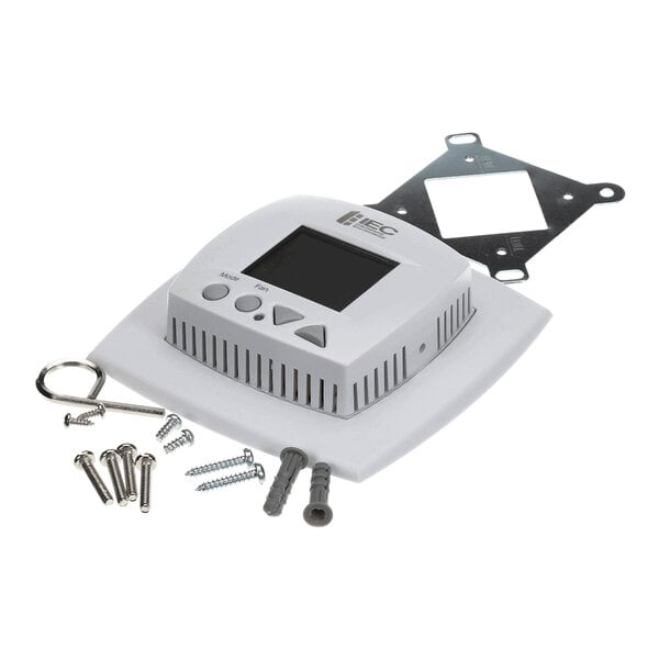 A digital thermostat kit with mounting hardware and accessories.