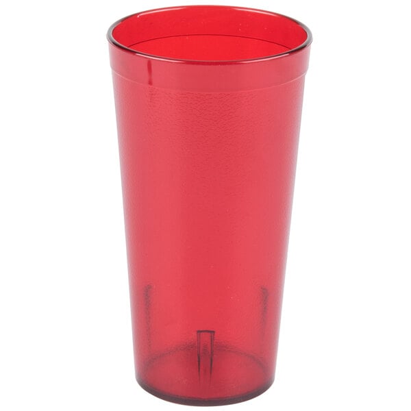 A close up of a Carlisle ruby red plastic tumbler with a white background.