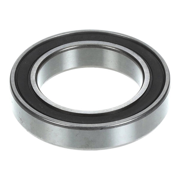 A metal bearing for a large motor, used in machinery or equipment.