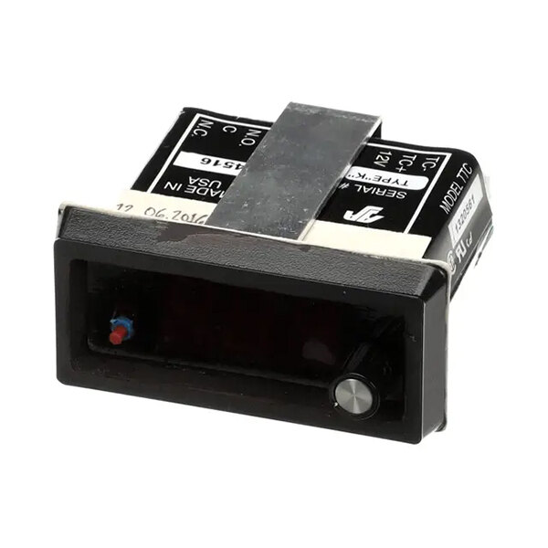 A rectangular Earthstone Ovens ESO-TTC temperature controller display with a front knob and indicator light.