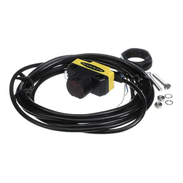 A photo eye sensor with an 18mm barrel, attached cable, and mounting hardware.