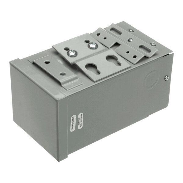 A gray metal transformer buck boost enclosure with mounting brackets and inspection labels.