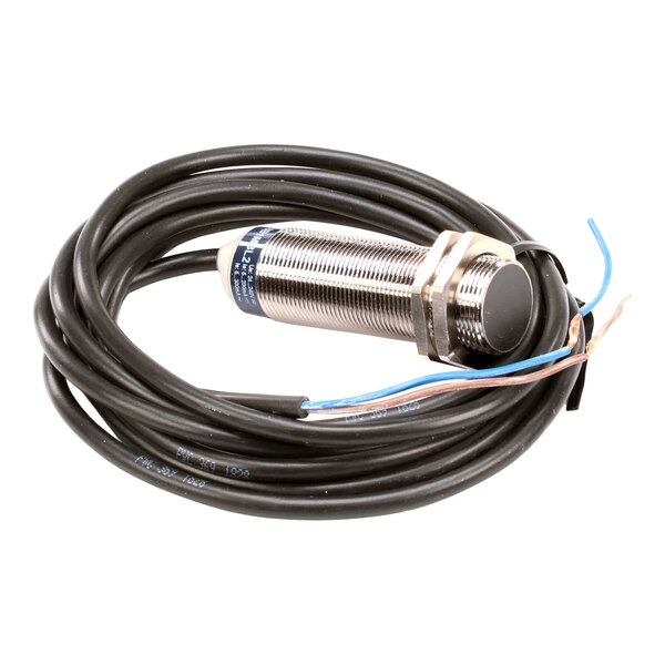 A cylindrical metal door sensor with a black face and attached black cable, used for industrial applications.