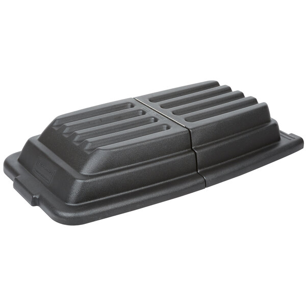 A black plastic Rubbermaid hinged dome lid on a table.