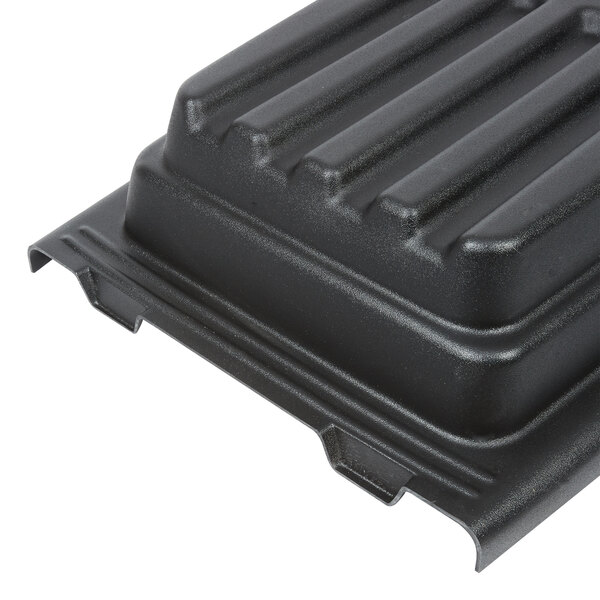 A black Rubbermaid plastic hinged dome lid on a table.
