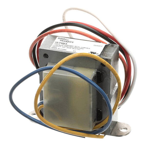 A metal electrical transformer with multiple colored wires attached.