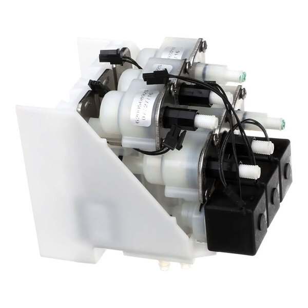 A Cornelius 4-valve assembly unit used for beverage dispensing systems.