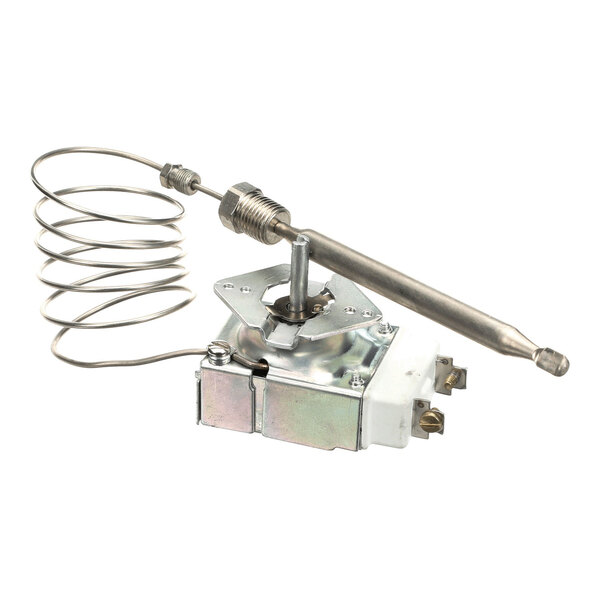 A metal commercial thermostat with a coiled sensor and electrical connectors.