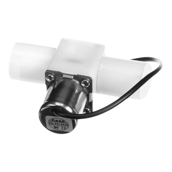 A white plastic valve stem kit with a metal component and attached black wire.