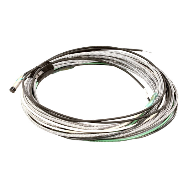 A coiled heater cable with a metallic braided exterior and exposed wire ends.
