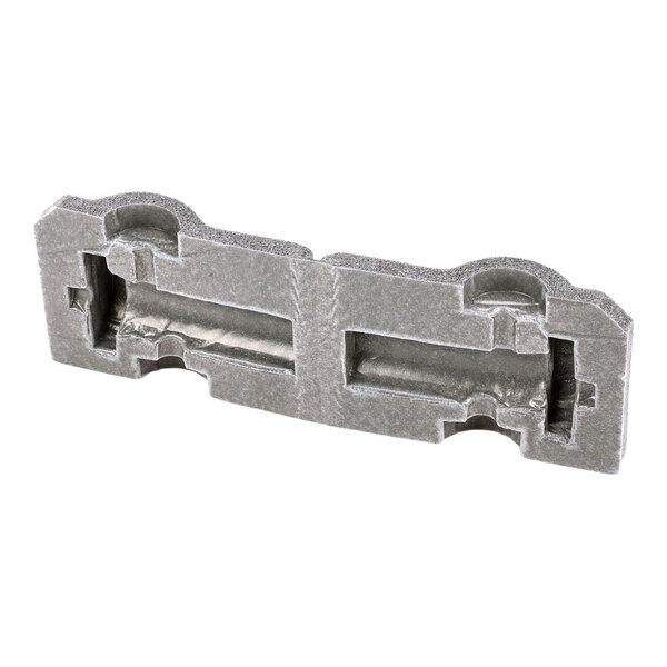 An insulated TXV wrap component made of molded gray foam material.