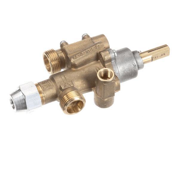 A brass gas valve for a chargrill, featuring multiple threaded ports and a control stem.