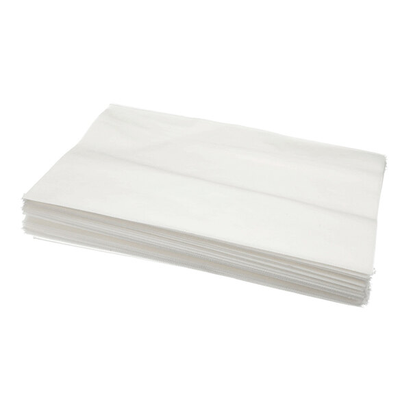 A stack of white filter paper sheets.