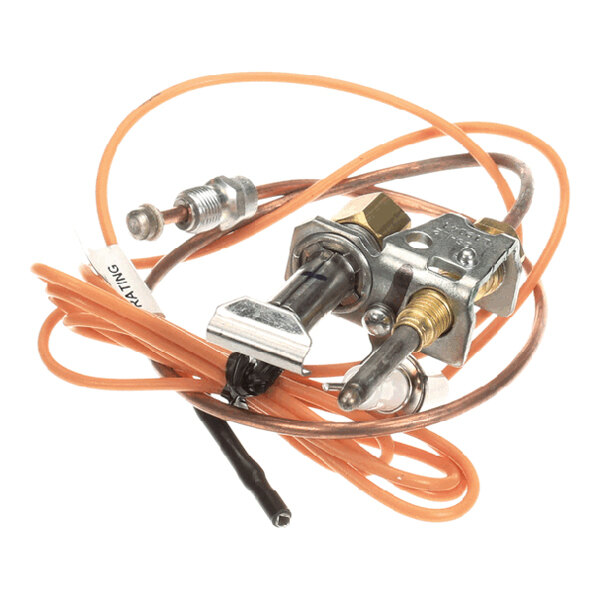 A pilot assembly with electric and thermocouple components for a Jade Range appliance.