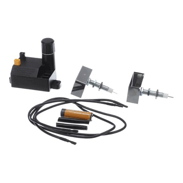 A remote ignition kit with electronic components, wiring, and mounting hardware.