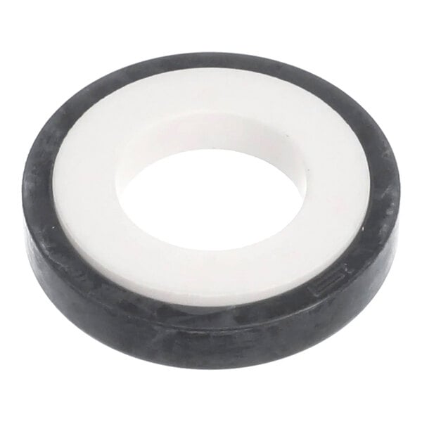 A round, flat, black and white auger stationary seal for use in Grindmaster-Cecilware equipment.