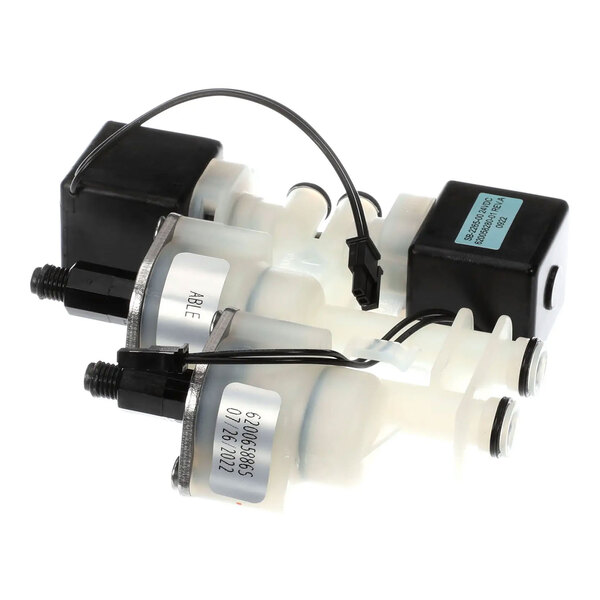 A Cornelius 620065886S body valve syrup assembly for MFV beverage dispensers.