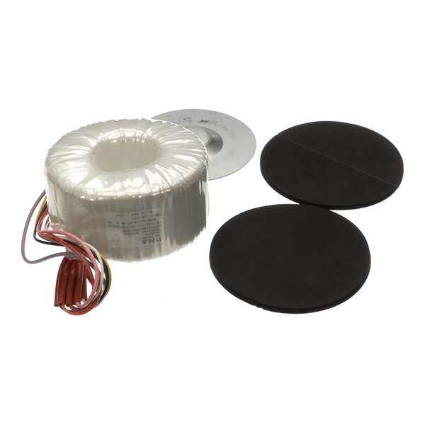A toroidal transformer kit with wires, a metal mounting plate, and two black insulating pads.