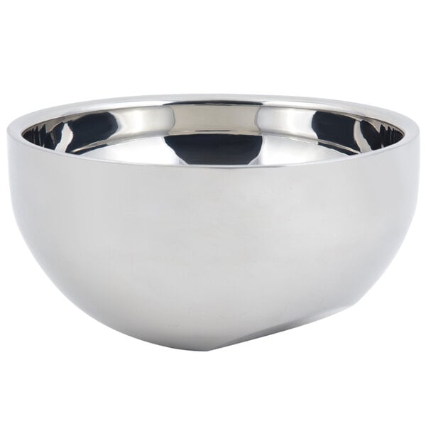 A silver stainless steel Bon Chef angled double wall bowl with a handle.