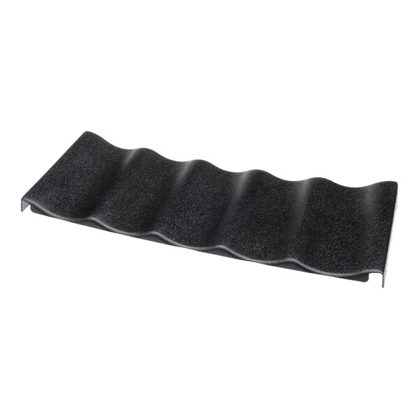 A black, wavy lower splash panel for a commercial beverage machine.