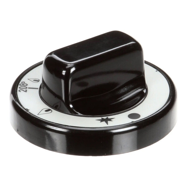 A black and white gas valve knob with various setting symbols, designed for controlling a gas appliance.