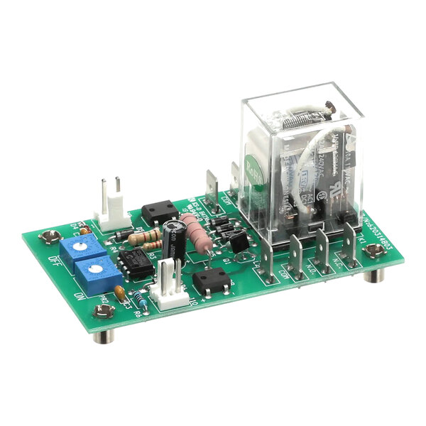 A green circuit board with various electronic components, including a relay, capacitors, resistors, and connectors, used as an agitator timer.