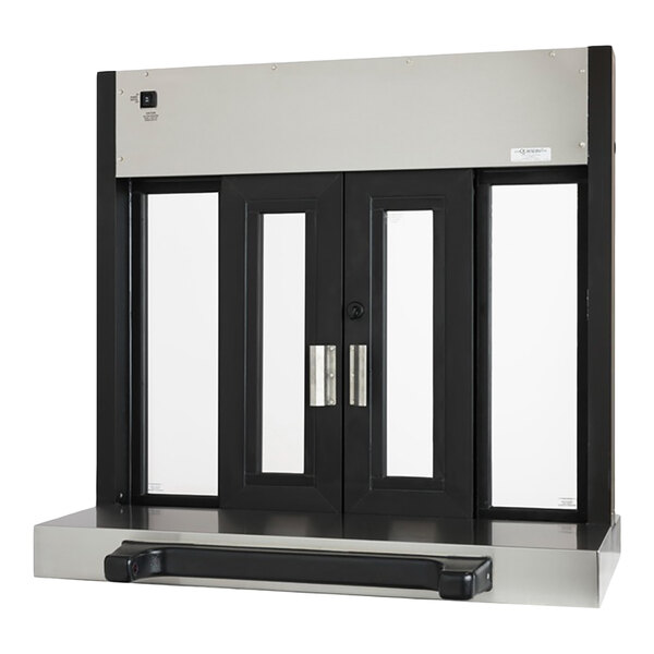 A black and silver automatic drive-thru window with glass panels and a handle.