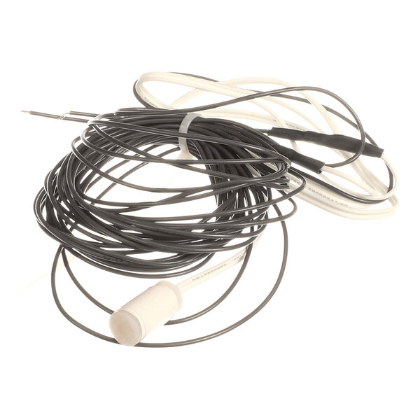 A coiled black and white cabinet sensor with attached wires.