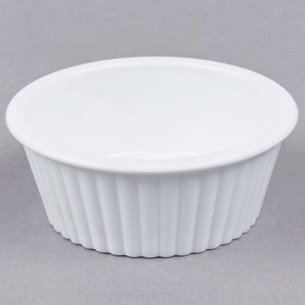 A white fluted plastic ramekin.