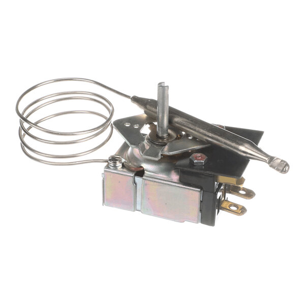 A metal thermostat component with a coiled sensing bulb and electrical terminals.