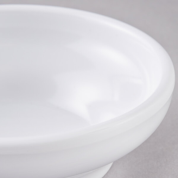 A white Carlisle salsa bowl with a white rim.