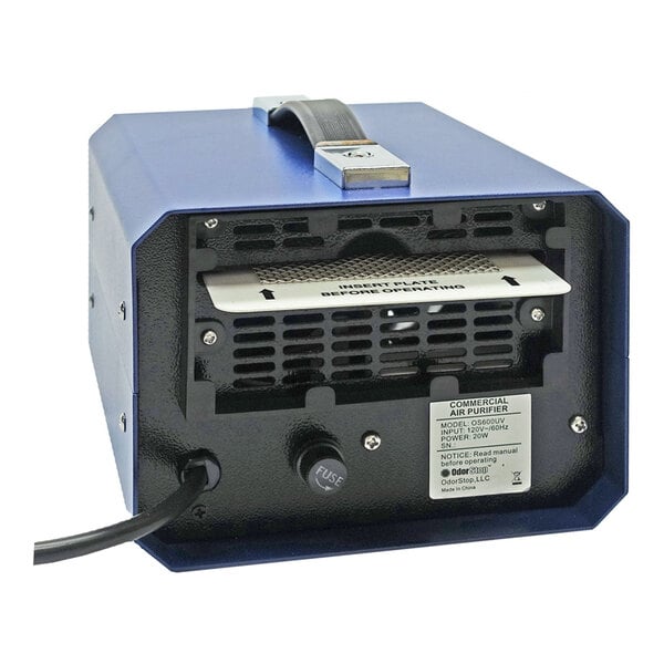 A commercial air purifier with a blue metal casing and a ceramic ozone plate installed.