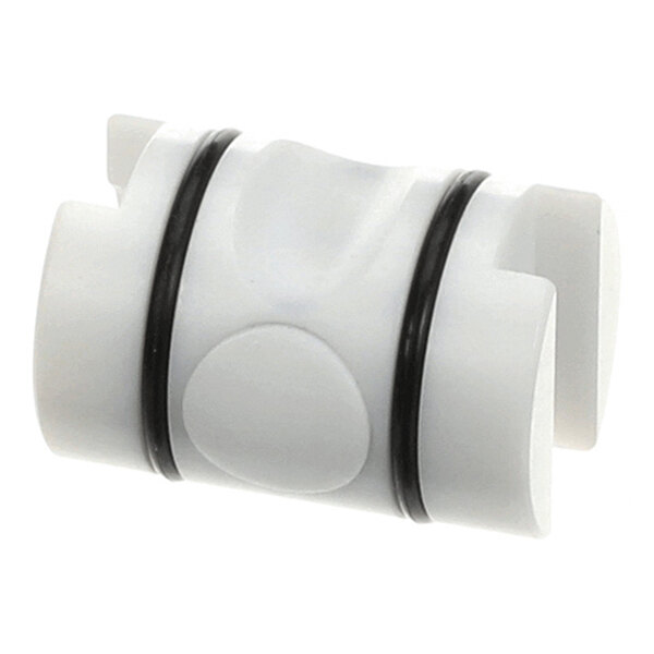 A white plastic center valve assembly with two black O-rings.