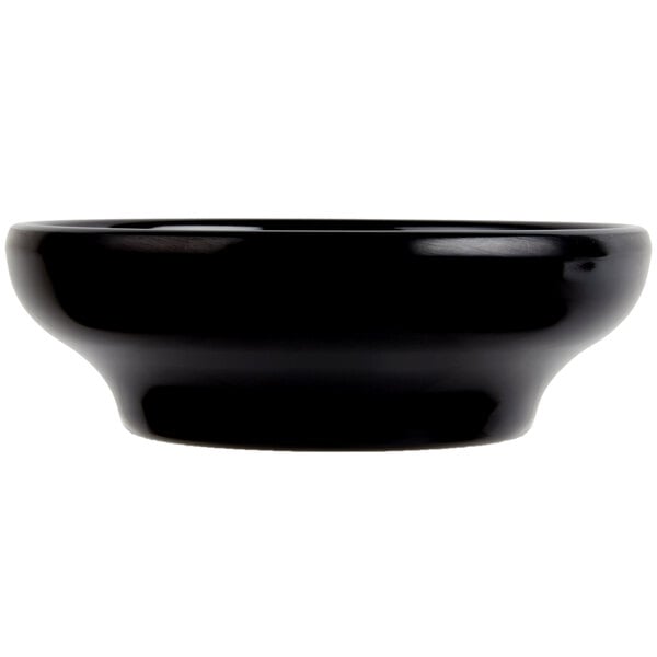 A black rectangular Carlisle salsa dish.
