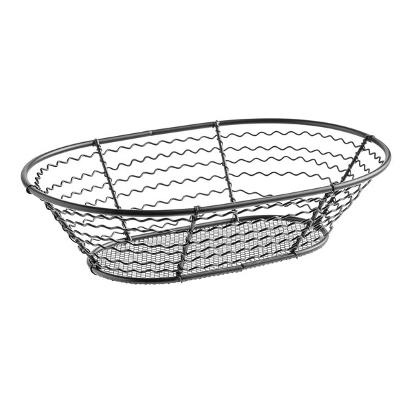 An American Metalcraft wire basket with wavy sides and a mesh bottom.