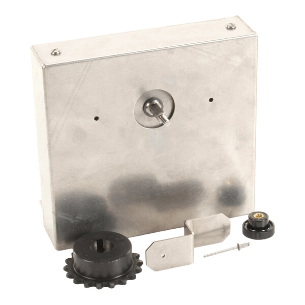 A metal drive assembly with clutch and feeder components, including an 18-tooth sprocket and various mounting hardware.