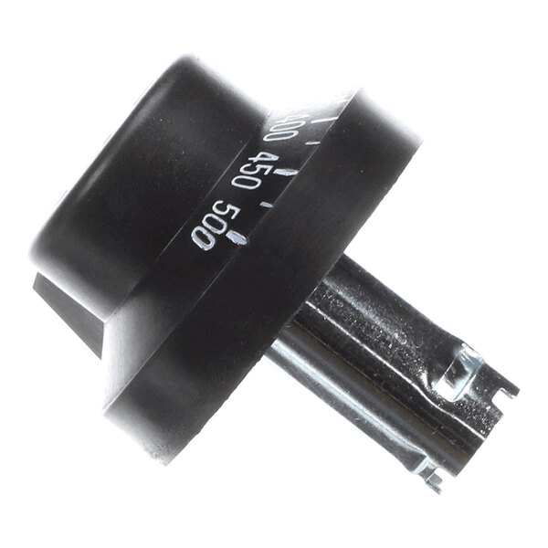 A black dial oven thermostat with temperature markings, used for controlling oven temperature.