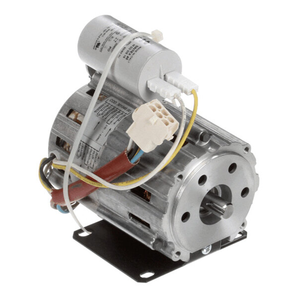 A metallic electric motor with attached capacitor and wiring, mounted on a black base plate.