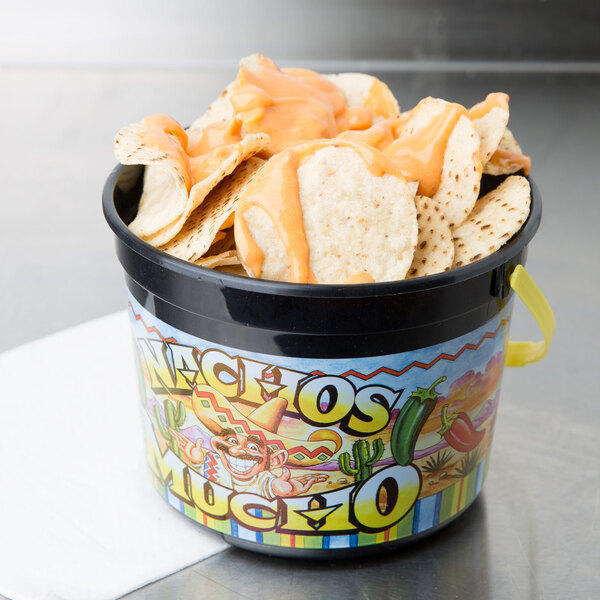 A 48 oz. plastic bucket filled with nachos and cheese sauce.