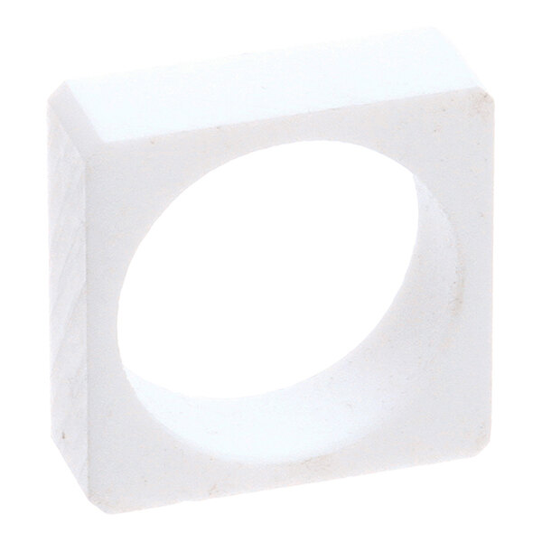 A white square bearing with a circular hole in the center, designed for a 1-1/4 inch shaft, used in a side panel.