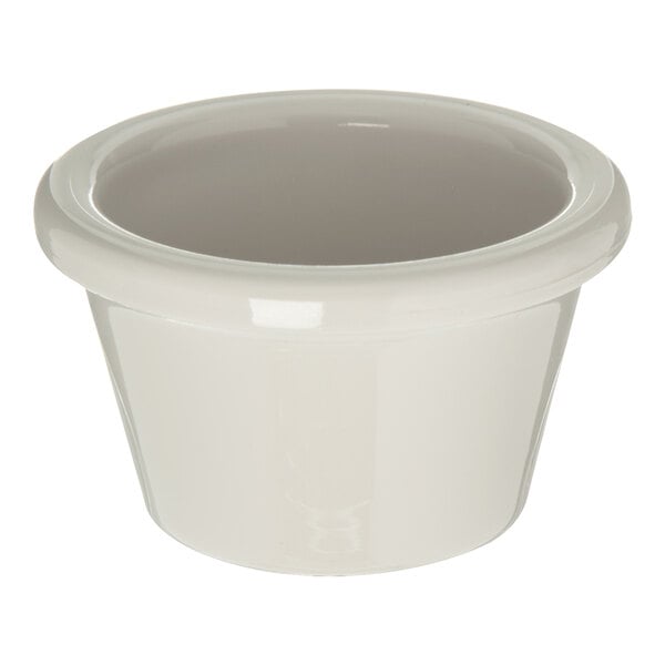 Carlisle 4312142 Bone White 1.5 oz. Smooth Plastic Ramekin - 48/Case