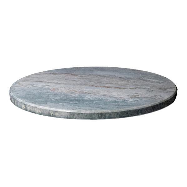 A round indoor table top with an eased edge and a washed stone finish.