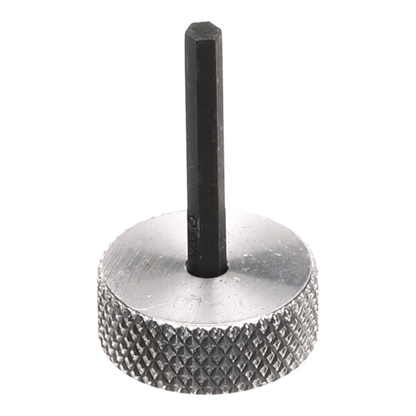 A metal tool with a knurled circular base and a hexagonal shaft, known as a Tool Brix.