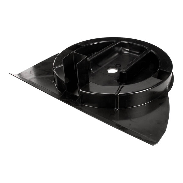 A black plastic paddlewheel area component for a Multiplex machine.