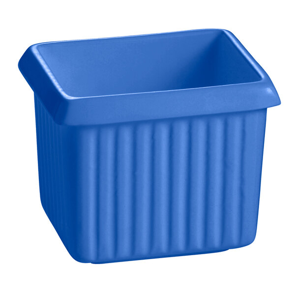 A cobalt blue cast aluminum rectangle server with a lid.