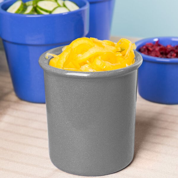 A grey Tablecraft granite condiment bowl with yellow food inside.