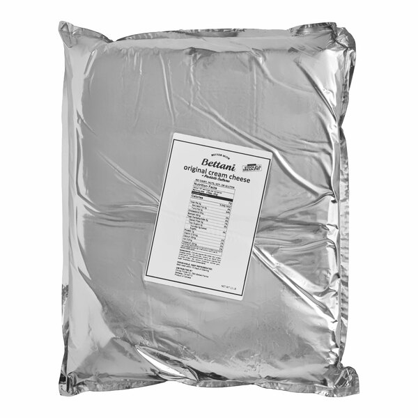 A large silver bag of Stockeld Dreamery Original Vegan Plant-Based Cream Cheese weighing 11 pounds.