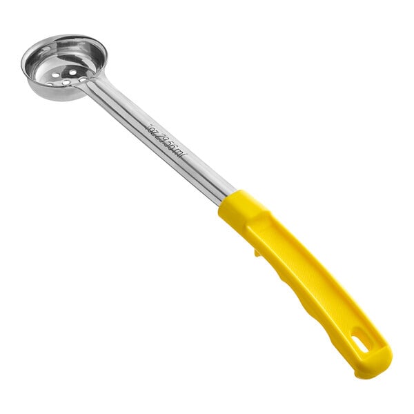 A metal portion spoon with a round, perforated bowl and a long handle featuring a yellow plastic grip.