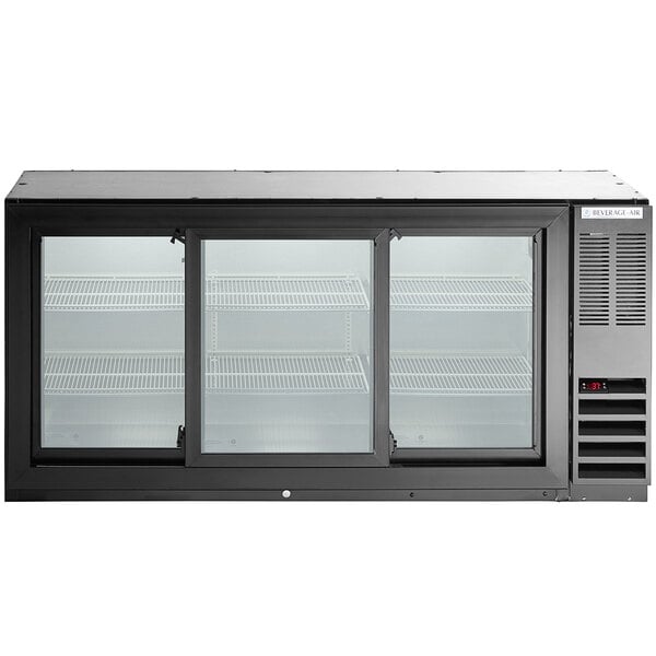A black underbar height back bar refrigerator with three sliding glass doors and interior shelving.