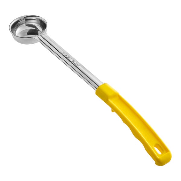 A metal portion spoon with a round bowl and a long handle featuring a bright yellow grip.